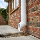 76mm Diameter Flush Joint Aluminium Downpipe Shoe — RAL 9016 (in use)