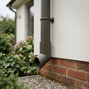 76mm Diameter Flush Joint Aluminium Downpipe Shoe — RAL 7022 (in use)