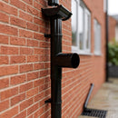 76mm Diameter Flush Joint Downpipe Branches — RAL 9005 / 112.5 Degrees (in use)