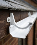 M6 Stainless Steel Washer for Moulded Gutter Direct Fix Brackets (100 pack) — RAL 9010 (in use)