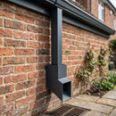 72x72mm Flush Joint Aluminium Downpipe Shoe — RAL 7016 (in use)