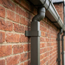 Aluminium Downpipe Clip 72×72mm with 5mm Wall Spacing — RAL 7022 (in use)