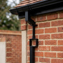 Adjustable Aluminium Pipe Clip 72×72mm – Flush Joint Downpipe — RAL 9005 (in use)