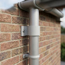 Aluminium Downpipe Clip 63mm Dia with 25mm Wall Offset — RAL 7035 (in use)