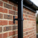 Adjustable Aluminium Pipe Clip 72×72mm – Flush Joint Downpipe — Textured Black (in use)