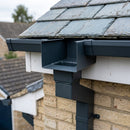 Aluminium Box Gutter Outlet 72×72mm to 135×100mm — RAL 7016 (in use)