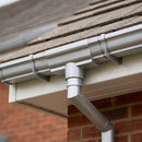 Moulded Ogee Gutter Outlet 63mm Dia, 125 x 100mm — RAL 9006 (in use)