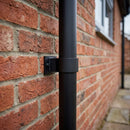 Aluminium Downpipe Clip 63mm Dia with 25mm Wall Offset — Textured Black (in use)