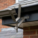 Moulded Ogee Gutter Rise and Fall Bracket 125 x 100mm — RAL 7022 (in use)