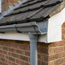 Moulded Ogee Gutter Outlet 63mm Dia, 125 x 100mm — RAL 7037 (in use)