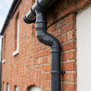 Traditional Adjustable Swanneck 76mm Dia Downpipe Connector — RAL 7021 (in use)