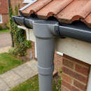 63mm Diameter Gutter Outlet Spigot Extender — RAL 7037 (in use)