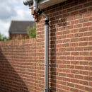 76mm Diameter Flush Joint Adjustable Swanneck Downpipe — RAL 9006 (in use)