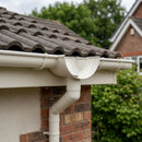 DeepFlow Aluminium Gutter Outlet 76mm Diameter 130mm — RAL 9010 (in use)