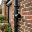76mm Diameter Flush Joint Downpipe Branches — Textured Black / 92.5 Degrees (in use)