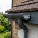 Half Round Aluminium Gutter Outlet 63mm Dia. 125mm — RAL 7021 (in use)