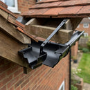 Moulded Ogee Gutter Top Rafter Bracket 125 x 100mm — RAL 9005 (in use)