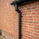 76mm Diameter Flush Joint Aluminium Downpipe Bends — RAL 7021 / 112.5 Deg (in use)