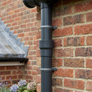 63mm Outlet to Downpipe Length Connector — RAL 7021 (in use)