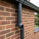 63mm Diameter Flush Joint Aluminium Downpipe Shoe — RAL 7016 (in use)