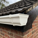 Moulded Ogee Gutter Right Hand Stop End 125 x 100mm — RAL 9010 (in use)