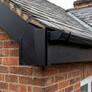 L Return Aluminium Fascia Board Joint Cover — RAL 9005 (in use)