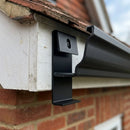 Moulded Ogee Gutter Direct Fix Bracket 125 x 100mm — RAL 9005 (in use)