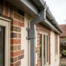 Aluminium Downpipe Clip 72×72mm with 5mm Wall Spacing — RAL 7037 (in use)