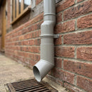 63mm Diameter Flush Joint Aluminium Downpipe Shoe — RAL 7036 (in use)