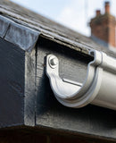 M6 Stainless Steel Washer for Moulded Gutter Direct Fix Brackets (100 pack) — RAL 9006 (in use)