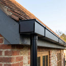 Aluminium Box Gutter Outlet 63mm Diameter 135 x 100mm — RAL 9005 (in use)