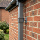 Adjustable Aluminium Pipe Clip 72×72mm – Flush Joint Downpipe — RAL 7037 (in use)