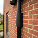 76mm Diameter Aluminium Downpipe Access Plate — Textured Black (in use)