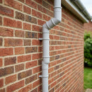 Flush Joint Adjustable Swanneck 63mm Downpipe Connector — RAL 7035 (in use)