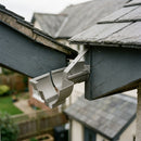 Moulded Ogee Gutter Top Rafter Bracket 125 x 100mm — RAL 7036 (in use)