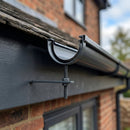 130mm Rise and Fall Gutter Bracket for Deepflow Aluminium System — RAL 7016 (in use)