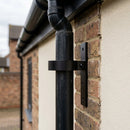 Adjustable Aluminium Pipe Clip 76mm Diameter — RAL 9005 (in use)