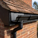 Moulded Ogee Gutter Outlet 63mm Dia, 125 x 100mm — Textured Black (in use)