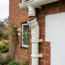 Traditional Adjustable Swanneck 76mm Dia Downpipe Connector — RAL 9010 (in use)