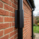 63mm Diameter Aluminium Downpipe Access Plate — Textured Black (in use)