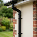 76mm Diameter Flush Joint Adjustable Swanneck Downpipe — RAL 9005 (in use)