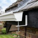 Moulded Ogee Gutter Rise and Fall Bracket 125 x 100mm — RAL 9010 (in use)