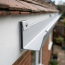 Moulded Ogee Gutter Direct Fix Bracket 125 x 100mm — RAL 9006 (in use)