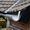 130mm Aluminium Gutter Top Rafter Bracket — RAL 9006 (in use)