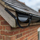 Half Round Aluminium Gutter Side Rafter Bracket 125mm — RAL 9005 (in use)
