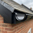 130mm Aluminium Gutter Top Rafter Bracket — RAL 9005 (in use)