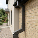 Flush Joint Aluminium Downpipe Bend 72x72mm — RAL 7022 / 92.5 Degrees (in use)