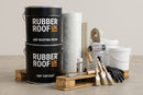 Complete GRP fibreglass roofing kit contents with Rubber Roof UK branded resin and topcoat tins, matting roll and tools