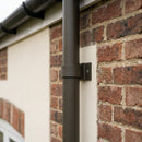 Aluminium Downpipe Clip 63mm Dia with 25mm Wall Offset — RAL 7022 (in use)