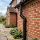 Flush Joint Aluminium Downpipe Bends 63mm Diameter — RAL 9005 / 112.5 Deg (in use)